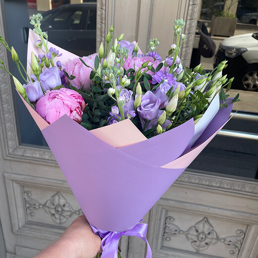 A bouquet of peonies, eustoma, mathiola