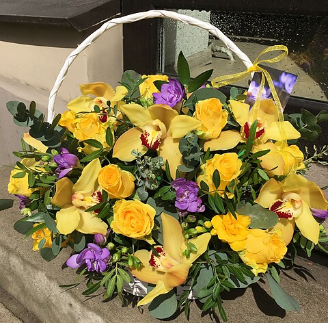 Roses and Orchids in the basket