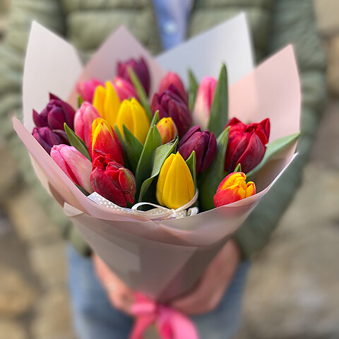 Tulips of different colors in decorative paper