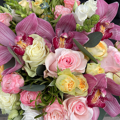 A bouquet of different flowers in soft tones