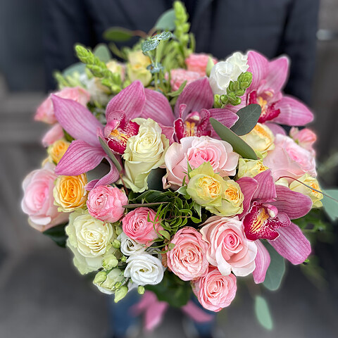 A bouquet of different flowers in soft tones