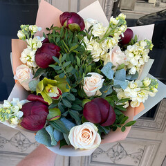 A bouquet of peonies, roses, mathiola