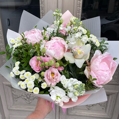 A bouquet of peonies and summer flowers