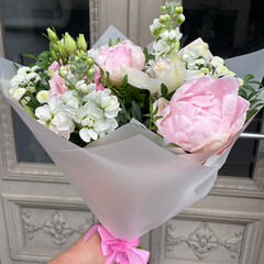 A bouquet of peonies and summer flowers