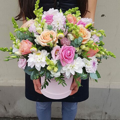 Dahlias, roses and seasonal flowers in a box