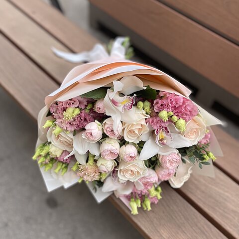 Pastel bouquet Tenderness on a wooden bench